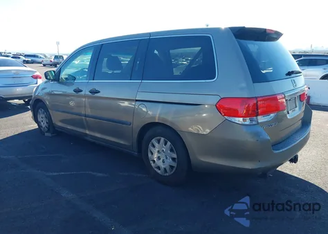 2010 Honda Odyssey Lx z USA, uszkodzony, nr VIN 5FNRL3H22AB042579